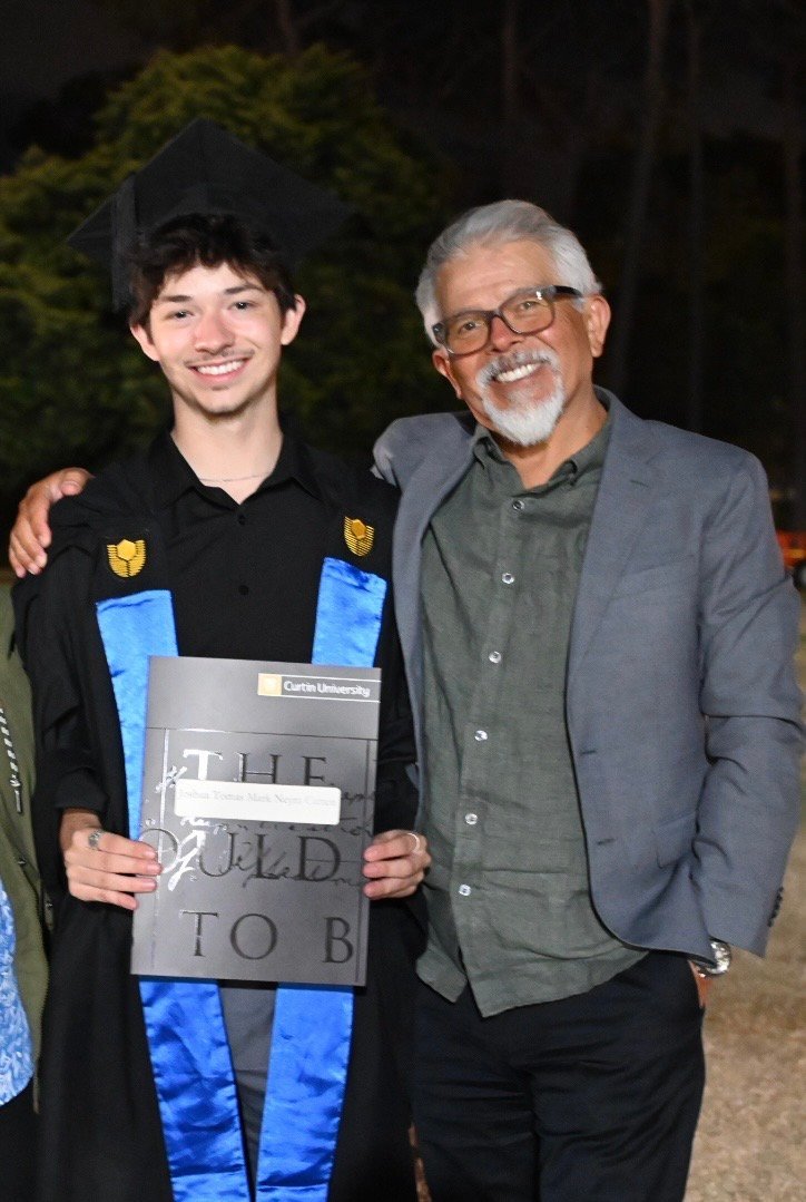 Joshua Neyra Cutten with his grandfather at his graduation